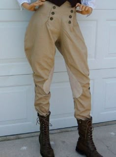 1930s Vintage style men/women equestrian riding pants Jodhpurs made from khaki color cotton fabric Attractive offwhite knee patches Black Button closer outside legs It can wear man and woman both for Riding horse & bike, Hunter, Jumper, Equitation classes or any events. Sizes available according waist:30, 32, 34, 36, 38 and made to measure. For Made to measure: We will send you measurement form after your order. Note:- Accessories(boots) price don't include in the product. Victorian Pants, Riding Pants Equestrian, Jodhpur Pants, Equestrian Pants, Polo Pants, Women's Equestrian, Mode Steampunk, Horse Riding Outfit, Retro Pants