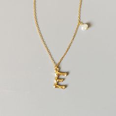 This is a simple yet beautiful letter pendant necklace on a dainty 18K gold plated 19"-21" chain. Makes the perfect personalized gift for any occasion. FEATURES Pendant Necklace in real 925 Sterling Silver Initial Pendant with Freshwater Pearl Comfortable to wear Lightweight and safe Hypoallergenic 🚚 Free Shipping Worldwide Estimated Delivery time: 8 to 13 business days 🎁 Ideal Gifts: Christmas gifts, family jewelry, friends gifts, couple gifts, anniversary gifts, birthday gifts, party gifts, Christmas Gifts Family, Gifts Couple, Bamboo Texture, Family Jewelry, Friends Gifts, Sterling Silver Initial, Letter Pendant Necklace, Family Jewellery, Gifts Anniversary