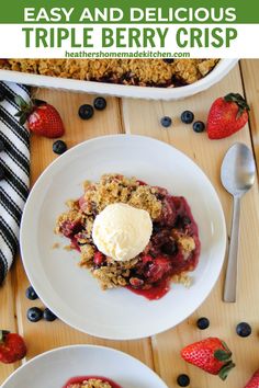 an easy and delicious triple berry crisp with ice cream on top is ready to be eaten