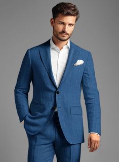 Give your wardrobe a touch of mystique with our Italian Linen French Blue Suit. This masterpiece is woven from the finest linen, guaranteeing both unparalleled comfort and lasting resilience, all while radiating an ageless allure. Bathed in a deep blue shade that echoes the depths of midnight sapphire, its flawless solid pattern exudes unique sophistication. Ideal for wearing at a wedding or navigating through formal events, this suit stands as the ultimate choice for infusing your collection with sartorial refinement.  Look Includes  Italian Linen French Blue Fabric  Two Button Jacket Style  Notch Lapel  Horn Royal Black Buttons  Single Vent  Three Cuff Buttons  Two Welted Back Pockets on Trousers   Click 'Customize Now' to modify the look if needed.  Lining: Viscose; Dry Clean. Luxury Linen Blazer With Pockets, Timeless Single-breasted Linen Suit, Timeless Linen Single-breasted Suit, Timeless Linen Suit For Formal Occasions, Timeless Linen Formal Suits, Timeless Formal Linen Suit, Blue Linen Blazer For Workwear, Timeless Linen Suits With Suit Collar, Timeless Linen Suit With Suit Collar