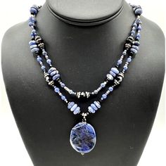 Vintage Sodalite Beaded Stone Double Strand Pendant Necklace Sterling Silver 925 (Sterling Silver hook clasp and beads. The 925 mark in on the inside of the hook.) Condition: Pre-owned in great condition. Please always see the item pictures for full item condition. Returns: Returns are accepted within 30 days of purchase. The items must be returned in the same condition as received. Questions: Please feel free to check out our feedback. If you have any questions at all, feel free to ask them. We Sodalite Gemstone Beads Necklaces, Silver Jewelry With Faceted Beads Made Of Lapis Lazuli, Silver Jewelry With Faceted Beads In Lapis Lazuli, Sapphire Gemstone Beads Sodalite Jewelry, Sapphire Gemstone Beads Jewelry In Sodalite, Beaded Jewelry Necklaces, Hook Clasp, Necklace Sterling Silver, Sterling Silber