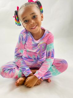 Are you looking for the perfect personalized gift for a special little one in your life? Look no further than these adorable pajamas!The pajamas are soft and comfortable. They're perfect for lounging around the house or getting a cozy night's rest and of course, they're stylish too. The tie dye design is sure to standout.Whether you're looking for a gift for a birthday or holiday or just want to treat your little one to something special, these pajamas are sure to please. Order your custom Pajam Adorable Pajamas, Painted Initials, Kids Closet, Personalized Pajamas, 2024 Outfits, Toddler Pajamas, Splatter Paint, Pajamas Gift, Purple Tie Dye