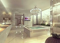 a large bathroom with a tub and chandelier