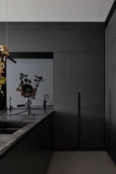 the kitchen counter is clean and ready to be used as a dining room or office