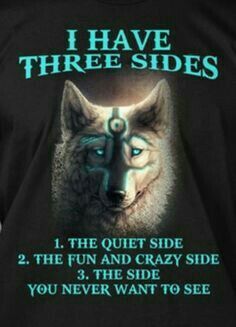 a black t - shirt with an image of a wolf and the words i have three sides