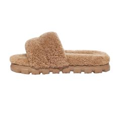 a women's slipper with sheep fur on the bottom