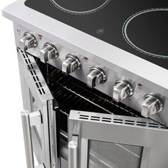 an oven with four burners and one door open