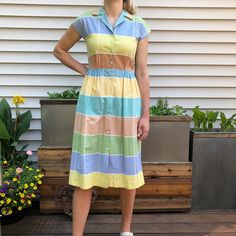 "Sweet cotton dress with white stripes of summer colors. Button front. In excellent condition. Note bottom button in photo has pulled- long stride. Measurements taken flat Bust 35\" Waist 26\" Hip. Open Back of neck to waist: 15 ½\" Length waist to hem: 27 ½\" Model is 5'10\" I can ship internationally. Please convo for pricing. PLEASE convo me if you have any further questions about this item or would like to see more pictures. I do my best to research items thoroughly before listing as well as Spring Striped Cotton Shirt Dress, Striped Cotton Shirt Dress For Spring, Striped Cotton Beach Shirt Dress, Striped Cotton Shirt Dress For Beach, Casual Cotton Shirt Dress With Striped Collar, Cotton Shirt Dress With Striped Collar For Daywear, Casual Shirt Dress With Striped Collar For Spring, Casual Striped Cotton Shirt Dress, Summer Cotton Shirt Dress With Striped Collar