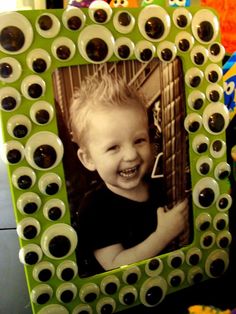 a green frame with an image of a child