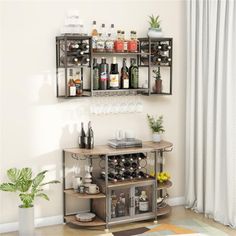 a wine rack with bottles and glasses on it