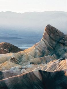 the mountains are covered in colorful rock formations