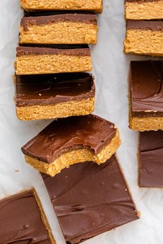 chocolate and peanut butter bars stacked on top of each other