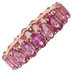 This stunning eternity band features 5.00ct of pink oval cut sapphires hand set to perfection in high polish 14k rose gold. All eternity bands are shown in a size 6.5. We custom craft each eternity band and will create the same design for you in your desired ring size. Please contact us with any questions. Thank you. Pink Sapphire Band, Memory Ring, Sapphire Eternity Band, Dream Rings, Mark Broumand, Sapphire Band, Dream Ring, Gorgeous Jewelry, Eternity Band