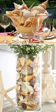 a vase filled with shells and flowers on top of a table