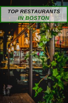 the top restaurants in boston with green and white signs hanging from it's sides