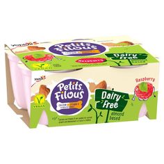 two boxes of yogurt sitting on top of each other in front of a white background