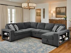 a living room with a gray sectional couch