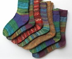 These socks were knitted by me in the round from self patterning sock yarn, 75% wool 25% polyamide. These socks are seamless, warm and durable. Machine wash, dry flat. Casual Knitted Socks For Gifts, Cheap Multicolor Handmade Socks, Casual Multicolor Handmade Socks, Warm Multicolor Winter Socks, Cozy Multicolor Knitted Socks, Multicolor Cozy Knitted Socks, Warm Cozy Multicolor Socks, Knit Wool Socks, Cozy Multicolor Hand-knitted Socks