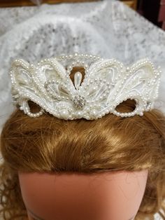 "Beautiful antique white pearls crown, please look at the pictures, it is ideal for First Communion, please look at every picture for the details. PLASTIC COMB ON THE BACK TO ATTACH TO HAIR. The veil is really streams of tulle falling down the shoulders 15\" long crown is 2\" high Please contact for any questions, or concerns. FINAL SALE, NO RETURNS, NO EXCHANGES." Princess Style Wedding Crown, Adjustable Ribbon Headpiece For Wedding, Wedding Crown With Structured Princess Style, Princess Style Wedding Crown With Structured Shape, Adjustable Princess Crown For Wedding, Princess Style Wedding Crown With Structured Design, Princess Style Structured Crown For Wedding, Elegant White Round Crown Headpiece, Elegant White Veil For First Communion