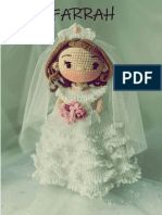 the doll is wearing a white dress and veil