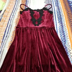 Romeo & Juliet Couture Burgundy Velvet Slip Dress With Contrast Embroidery Pics Dont Do Her Justice Approx. 47"L Down Center Back. Camisole-Style Neckline. Adjustable Spaghetti Shoulder Straps. Natural Waist. Pleated A-Line Skirt. Pullover Style. Polyester/Spandex. Polyester Lining. Hand Wash Purchased At Neiman Marcus Nyc Gothic Style Victorian Bustier Dress Style Very Very Pretty, Very Feminine B2d3 Bundle 2+ Items For Discount Shipping Purple V-neck Dress With Lace Trim, Purple Lace Patchwork Dress, Velvet Slip Dress, Bustier Dress, Romeo And Juliet, Couture Dresses, Gothic Fashion, Pullover Styling, A Line Skirts