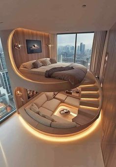 this bedroom has two circular beds and a spiral staircase leading to the second floor, with a view of the city below