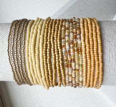 This Tiny Seed Bead Stretch Bracelet Set is ideal for stacking and perfect for boho layering jewelry. *  Purchase multiples and save *  Made from tiny glass seed beads (2mm)  *  Available in multiple sizes *  Strung on durable beading elastic. *  Shipped to you in our recyclable packaging 🦋YOU MAY ALSO LIKE Daisy & Dahlia Bracelets https://etsy.me/4855PlF Seed Bead Bracelets https://etsy.me/3Q3aO01 Tila Bracelets- https://etsy.me/3phAFHw  🦋DON'T SEE YOUR SIZE LISTED? The sizes we have listed are what we keep on hand to ship as quickly as possible We are happy to make a custom size.  Simply drop us a note to request a custom size Custom size requests are fulfilled based on supply availability 🦋 FIND THE PERFECT FIT * Measure all the way around your wrist with a tape measure or string  * Tila Bracelets, Layering Jewelry, Handmade Packaging, Boho Layering, Recyclable Packaging, Bead Bracelets, Layered Jewelry, Seed Bead Bracelets, Glass Seed Beads