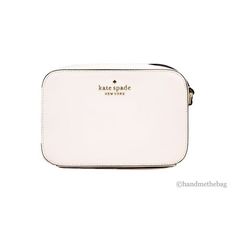 Style: Kate Spade Staci Camera Crossbody Bag (Light Rose) Material: Saffiano Leather Features: Inner Slip Pockets, Zip Closure, Jacquard Lining, Outer Slip Pocket, Adjustable Crossbody Strap Measures: 19.05 cm W x 12.7 cm H x 5.71 cm D Size: S.  Color: Pink.  Gender: female.  Age Group: adult. White Saffiano Leather Rectangular Bag, White Saffiano Leather Travel Bag, Kate Spade Staci, Pink Camera, Mini Light, Leather Camera Bag, Light Rose, Bag Light, Rose Lights