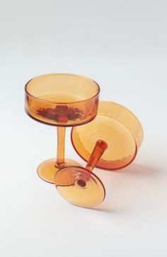 two glass dishes sitting on top of each other