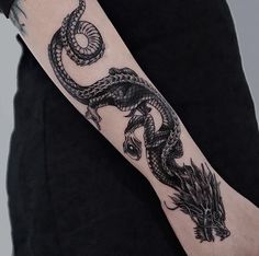 a person with a tattoo on their arm