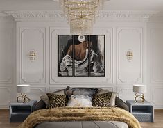 a large bed sitting under a chandelier in a bedroom