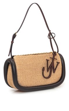 Modern and playful, this rendition of the Bumper Small shoulder bag is made from raffia with the exception of the brown-hued leather trims.Closure: zipped topInternal details: card slot, fabric liningMaterial: raffia, leatherTrim: cow leatherAdjustable shoulder strapMin. length shoulder strap: 18.5"/47cmMax. length shoulder strap: 21.5"/ 55cmMade in Spain Designer Brown Shoulder Bag For Vacation, Designer Brown Shoulder Bag For Beach, Chevron Jewelry, Shoes Flats Sandals, Jw Anderson, Boots And Sneakers, Small Shoulder Bag, Natural Brown, Cow Leather