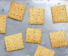 crackers arranged on a baking sheet ready to be baked in the oven for dinner