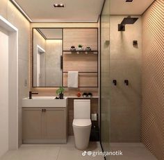 a bathroom with a toilet, sink and shower stall in it's own space