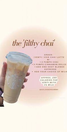 a hand holding a starbucks drink with the words, the filthy chai on it