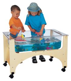 two children playing with an aquarium table