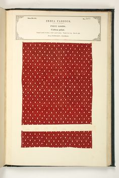 an open book with red and white polka dots