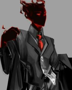 a man in a suit and red tie