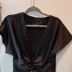 Brand New With Tags Rachel Zoe Twist Front Side Zipper Low Cut Front Silky Look And Feel Armpit To Armpit 16.5 Inches Length 17.5 Cropped Very Cute Date Night,Night Out Easy To Dress It Up Black Short Sleeve Crop Top For Evening, Black V-neck Crop Top For Evening, Chic Short Sleeve Tops For Going Out, Chic Tops For Going Out With Short Sleeves, Black Crop Top For Date Night, Casual Crop Top For Evening, Black Cropped Tops For Going Out, Satin Wrap Blouse, Cute Date Night