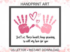 handprint art with two pink hands and hearts in the frame on a white background