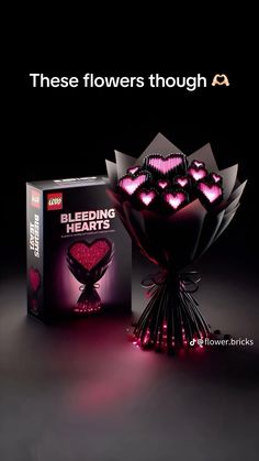 the packaging is designed to look like a heart - shaped bouquet with pink lights on it