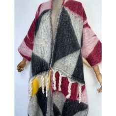 This super soft and warm wool cardigan kimono is perfect for the cold weather. Unlike other sweaters and wools, the wool used for this beauty is non itchy. Think of your favorite throw blanket, the comfort and warmth it gives but 10x stylish and wearable any where. This kimono is all that and more! One size fits S-4X Material: Wool Cozy Wool Shawl One Size, One Size Cozy Wool Shawl, Cozy One-size Wool Shawl, Cozy Multicolor Sweater Coat For Layering, Cozy Multicolor Wool Cardigan, Cozy Wool Wraps For Fall, Warm Wool Cozy Cardigan, Cozy Wool Cardigan, Warm Cozy Wool Cardigan