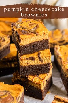 pumpkin cheesecake brownies stacked on top of each other with text overlay that reads pumpkin cheesecake brownies