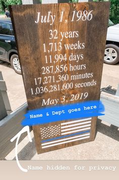 a wooden sign with an american flag on it that reads july 1, 1960 and three years