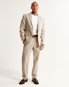 Our classic suit pants in our linen-blend fabric, featuring front pleat details. Tailored easy fit through the leg with a slight taper, featuring a shorter inseam designed to hit at the ankle and give a cleaner visual. For a standard visual, choose a longer inseam. Beige Texture, Guest Attire, Suit Pant, Mens Linen, Classic Suit, Men's Suits, Tailored Suits, Suit Pants, Tailored Jacket