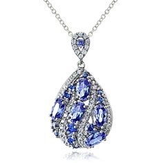 This attractive necklace showcases a fashionable teardrop pendant set with a mix of blue and clear cubic zirconia stones. The pendant dangles from an 18-inch rolo chain and is crafted of sterling silver. Product Details Metal Type sterling-silver Metal Stamp 925-sterling Weight 4.4GR Length 17MM Width 18IN Height 32MM Clasp Type spring-ring Chain Type rolo Stone Details Gem Type tanzanite Number of Stones 17 Stone Color blue Stone Shape oval-shape Total Weight 3.7 Setting Type prongs Stone Creat Sapphire Teardrop Pendant Necklace In Cubic Zirconia, Sapphire Teardrop Crystal Necklace, Sapphire Crystal Teardrop Necklace, Tanzanite Necklace, White Gold Necklaces, Teardrop Necklace, Teardrop Pendant, Royal Jewelry, Rolo Chain