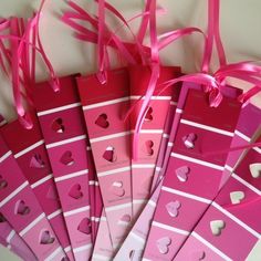 valentine's day gift tags with pink ribbon and heart cutouts on the side