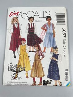 "McCalls 5057 FF. 1990s sewing pattern. Sizes 10-12-14. Chest 28-32\". Split skirt variations plus skirt. Side pockets. Great piece for beginners. Condition good. Uncut. Envelope shows some wear. See all photos for more information." Halloween Sewing Patterns, Fashion Basics, Childrens Sewing Patterns, Jumper Outfit, Girls Jumpers, Mccalls Sewing Patterns, Split Skirt, Couture Vintage, Mccalls Patterns