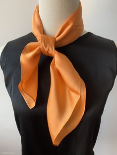 Luxurious natural mulberry silk square scarf, color orange, size: 65 cm x 65 cm / 26 in x 26 in. Soft, smooth, and lustrous silk charmeuse fabric, breathable and skin-friendly feels very soft and comfortable to wear. Can style in many ways: you can wear this scarf as a soft neck scarf, as a hair tie, as a headband scarf, as a wrist scarf, as a purse accessory. Or style it in any way you want with your own sense of creativity! Suitable for all seasons and is a great gift idea for special occasion Silk Scarves Perfect For Gifts, Solid Silk Scarf Gift, Solid Color Silk Scarf For Formal Summer Occasions, Orange Silk Scarf For Summer Gift, Elegant Orange Silk Scarf For Gift, Elegant Orange Silk Scarf As Gift, Elegant Orange Silk Scarf, Elegant Orange Summer Scarf, Classic Silk Scarf For Formal Summer Events