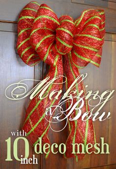 a red and green christmas bow hanging on a door with the words merry bub